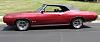Click image for larger version

Name:	69 GTO Burgundy convertible top up e.jpg
Views:	149
Size:	35.6 KB
ID:	458736